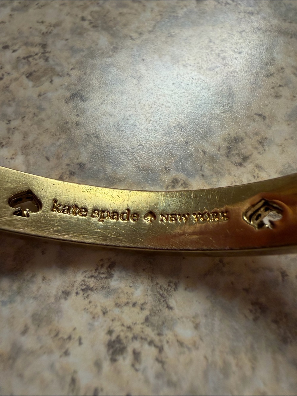 kate spade Gold Tone Logo Bangle Bracelet